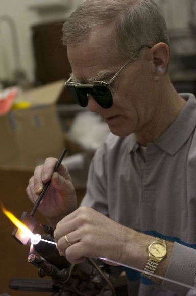 Pete Hatch glassblowing at the bench